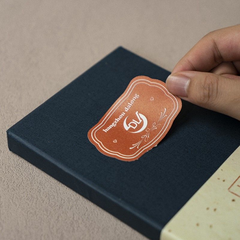 Rigid box seal sticker