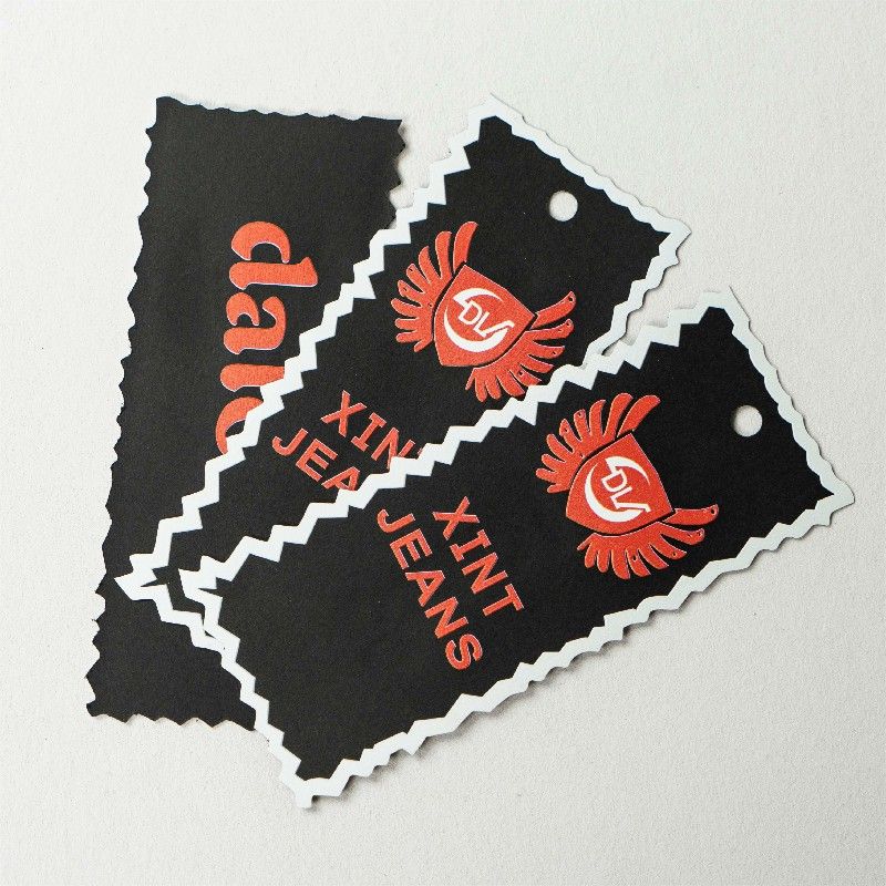 Die-cut black and red tags